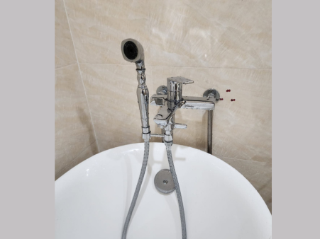 Residential plumber Singapore repairing bathroom sink SG Handyman Engineering
